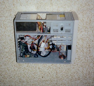 Yes, that is tape over the modem speaker.  Shut up.  Its a crude method of 'volume control'